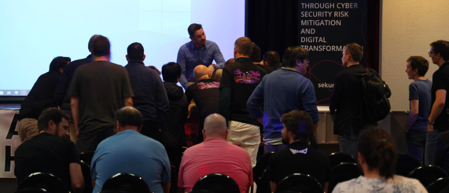 Autohackers delegates checking out a drone after the presentation